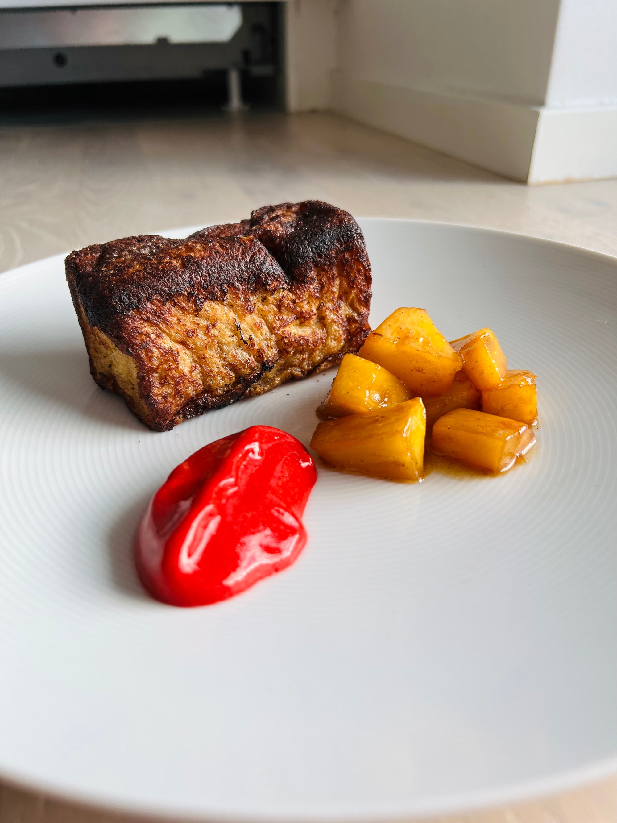 Pain Perdu with Flambéed Pineapple and Raspberry Coulis